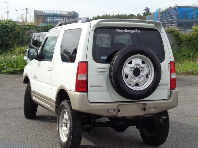 ジムニー ランドベンチャー ターボ パートタイム4WD 前後バンパー 背面タイヤ 16インチ リフトアップ マフラー HIDライト キーレス メモリーナビ DVD再生 CD ワンセグTV ハーフレザー 走行6.1万 取説記録簿(10枚目)