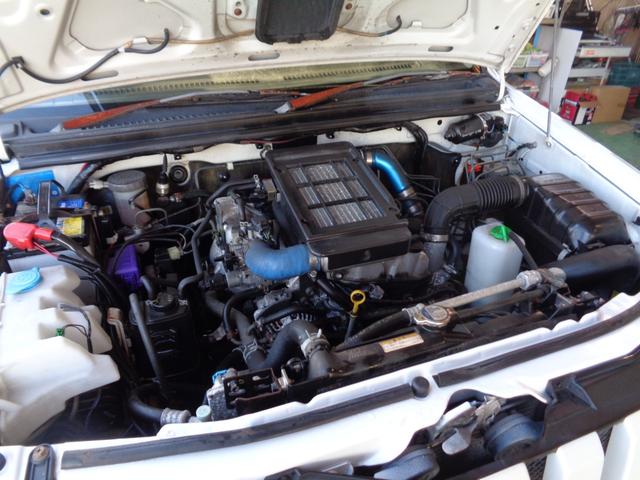 ジムニー ランドベンチャー ターボ パートタイム4WD 前後バンパー 背面タイヤ 16インチ リフトアップ マフラー HIDライト キーレス メモリーナビ DVD再生 CD ワンセグTV ハーフレザー 走行6.1万 取説記録簿(18枚目)