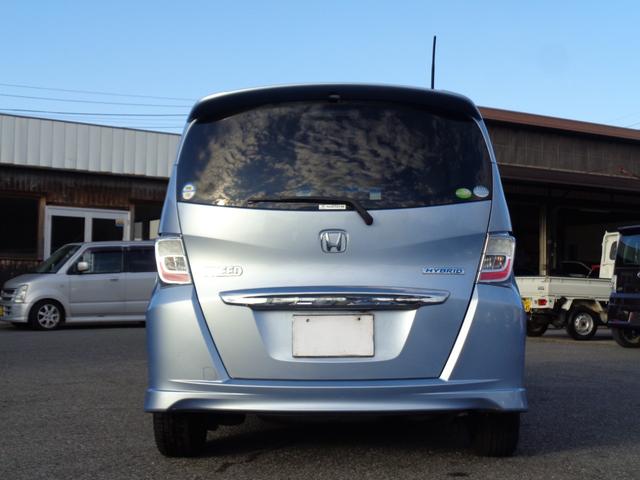 フリードハイブリッド ジャストセレクション 純正フルエアロ 15インチ HIDライト WエアB ABS スマートキー HDDナビ DVD再生 CD Bluetooth ワンセグTV Bカメラ ETC 左パワスラ クルコン 走行67810キロ(4枚目)