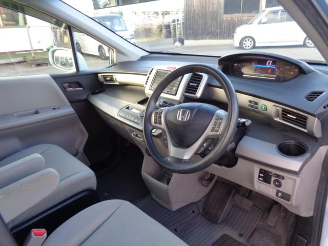 フリードハイブリッド ジャストセレクション 純正フルエアロ 15インチ HIDライト WエアB ABS スマートキー HDDナビ DVD再生 CD Bluetooth ワンセグTV Bカメラ ETC 左パワスラ クルコン 走行67810キロ(13枚目)