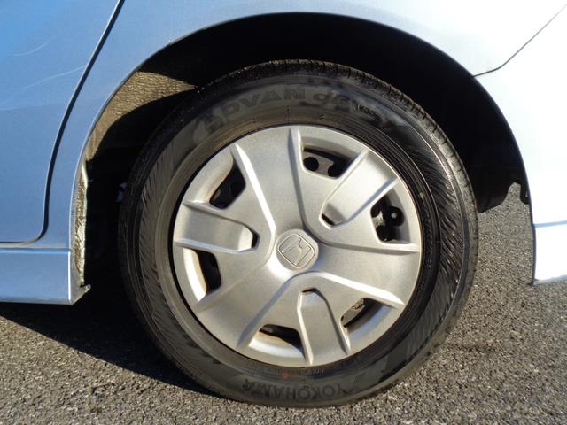 フリードハイブリッド ジャストセレクション 純正フルエアロ 15インチ HIDライト WエアB ABS スマートキー HDDナビ DVD再生 CD Bluetooth ワンセグTV Bカメラ ETC 左パワスラ クルコン 走行67810キロ(16枚目)