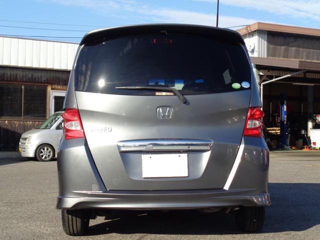 フリード フレックス　エアロ　純正フルエアロ　１５インチ　ＨＩＤライト　ＷエアＢ　ＡＢＳ　スマートキー　ＨＤＤナビ　ＤＶＤ再生　ＣＤ　Ｂｌｕｅｔｏｏｔｈ　ワンセグＴＶ　Ｂカメラ　ＥＴＣ　両側パワースライドドア　５人乗　走行６．７万（4枚目）