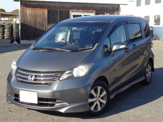 フリード フレックス　エアロ　純正フルエアロ　１５インチ　ＨＩＤライト　ＷエアＢ　ＡＢＳ　スマートキー　ＨＤＤナビ　ＤＶＤ再生　ＣＤ　Ｂｌｕｅｔｏｏｔｈ　ワンセグＴＶ　Ｂカメラ　ＥＴＣ　両側パワースライドドア　５人乗　走行６．７万（7枚目）