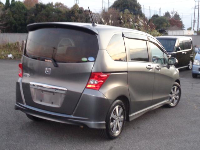 フリード フレックス　エアロ　純正フルエアロ　１５インチ　ＨＩＤライト　ＷエアＢ　ＡＢＳ　スマートキー　ＨＤＤナビ　ＤＶＤ再生　ＣＤ　Ｂｌｕｅｔｏｏｔｈ　ワンセグＴＶ　Ｂカメラ　ＥＴＣ　両側パワースライドドア　５人乗　走行６．７万（9枚目）