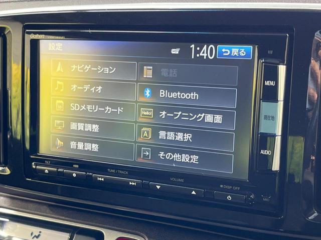 プレミアム・Ｌパッケージ　禁煙車　純正ナビ　２トーンカラー　バックカメラ　Ｂｌｕｅｔｏｏｔｈ再生　フルセグＴＶ　ＥＴＣ　スマートキー　オートライト　オートエアコン　革巻きステアリング　ＤＶＤ再生　ＣＤプレーヤー　盗難防止装置(23枚目)