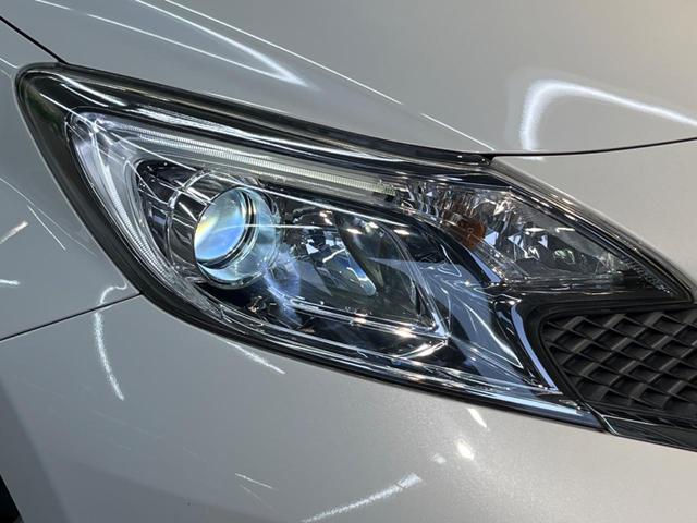 ノート Ｘ　Ｖセレクション＋セーフティ　衝突被害軽減システム　禁煙車　スマートキー　ＬＥＤヘッド　車線逸脱警報　オートライト　オートエアコン　ＥＴＣ　アイドリングストップ　横滑り防止装置　シートリフター　電動格納ミラー（14枚目）