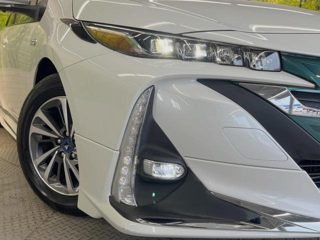 プリウスＰＨＶ Ｓ　モデリスタエアロ　純正９型ナビ　衝突被害軽減装置　バックカメラ　モデリスタ１５インチアルミホイール　ＬＥＤヘッドライト　シートヒーター　オートエアコン　電動格納ドアミラー　禁煙車（12枚目）