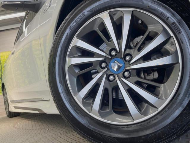 プリウスＰＨＶ Ｓ　モデリスタエアロ　純正９型ナビ　衝突被害軽減装置　バックカメラ　モデリスタ１５インチアルミホイール　ＬＥＤヘッドライト　シートヒーター　オートエアコン　電動格納ドアミラー　禁煙車（13枚目）