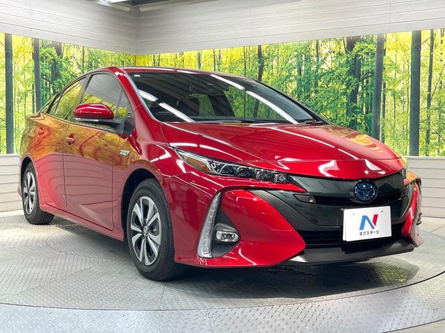 プリウスＰＨＶ Ｓナビパッケージ　メーカー１１．６型ナビ　全周囲カメラ　衝突被害軽減システム　レーダークルーズ　禁煙車　スマートキー　ＬＥＤヘッド　ビルトインＥＴＣ　オートハイビーム　車線逸脱警報　オートライト　オートエアコン（16枚目）