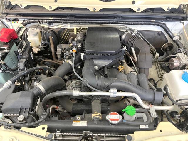 ジムニー XC ターボ 4WD MT車 衝突被害軽減システム 禁煙車 ドラレコ スマートキー LEDヘッド ETC クルコン 車線逸脱警報 オートライト オートエアコン 純正16インチアルミ CD フォクライト(18枚目)