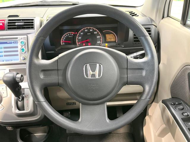 ゼスト D 純正DVDナビ 禁煙車 スマートキー オートエアコン CD 電動格納ミラー 盗難防止システム 衝突安全ボディー ドアバイザー ベンチシート パワーウィンドウ(11枚目)