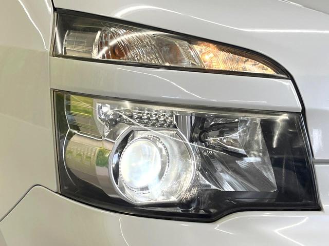 ヴォクシー ZS 煌 両側電動ドア 純正HDDナビ 後席モニター バックカメラ 禁煙車 スマートキー HIDヘッド ビルトインETC オートライト オートエアコン 純正16インチアルミ Bluetooth CD(47枚目)