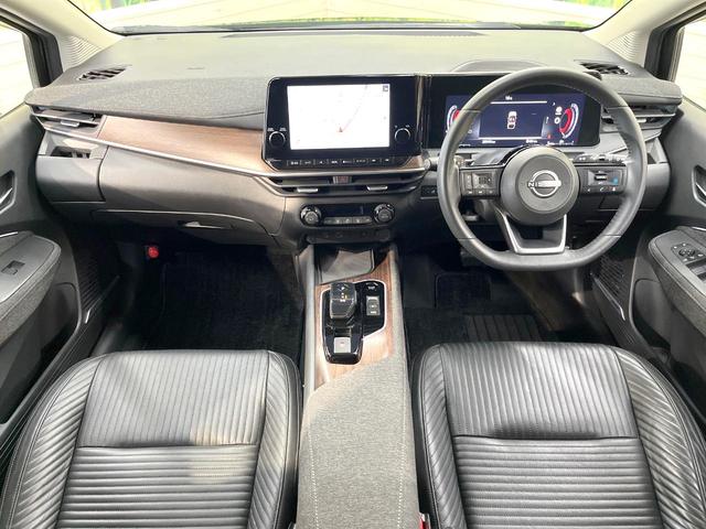 オーラ Ｇ　レザーエディション　純正９インチナビ　全周囲カメラ　ＢＯＳＥサウンドシステム　衝突被害軽減システム　レーダークルーズ　禁煙車　レザーシート　コーナーセンサー　スマートキー　ＬＥＤヘッド　ＥＴＣ２．０　オートハイビーム（2枚目）