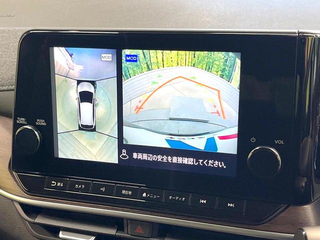 オーラ Ｇ　レザーエディション　純正９インチナビ　全周囲カメラ　ＢＯＳＥサウンドシステム　衝突被害軽減システム　レーダークルーズ　禁煙車　レザーシート　コーナーセンサー　スマートキー　ＬＥＤヘッド　ＥＴＣ２．０　オートハイビーム（5枚目）