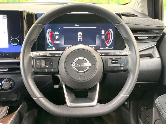 オーラ Ｇ　レザーエディション　純正９インチナビ　全周囲カメラ　ＢＯＳＥサウンドシステム　衝突被害軽減システム　レーダークルーズ　禁煙車　レザーシート　コーナーセンサー　スマートキー　ＬＥＤヘッド　ＥＴＣ２．０　オートハイビーム（11枚目）