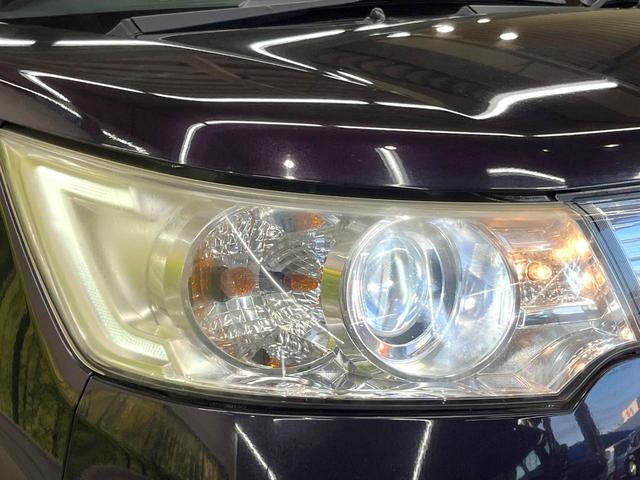 ワゴンRスティングレー X HDDナビ 禁煙車 スマートキー HIDヘッド オートライト オートエアコン 純正14インチアルミ CD 地デジ アイドリングストップ 電動格納ミラー シートリフター アームレスト(28枚目)