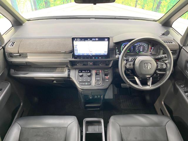 ステップワゴン ｅ：ＨＥＶスパーダ　プレミアムライン　両側電動ドア　純正１１インチナビ　後席モニター　全周囲カメラ　衝突被害軽減システム　アダプティブクルーズコントロール　禁煙車　電動リアゲート　合皮　ドライブレコーダー　スマートキー　ビルトインＥＴＣ（2枚目）