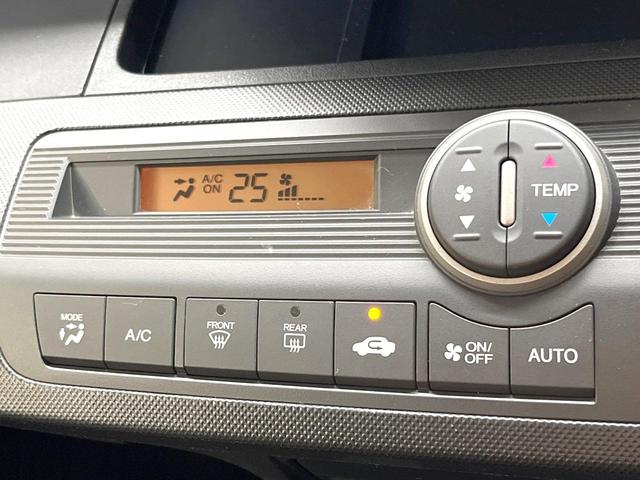 フリード Ｇ　ジャストセレクション　純正ナビ　電動スライドドア　バックカメラ　禁煙車　スマートキー　ＥＴＣ　オートエアコン　ＣＤ　ＤＶＤ再生　地デジ　電動格納ミラー　横滑り防止　プライバシーガラス　パワーウィンドウ　パワーステアリング（7枚目）