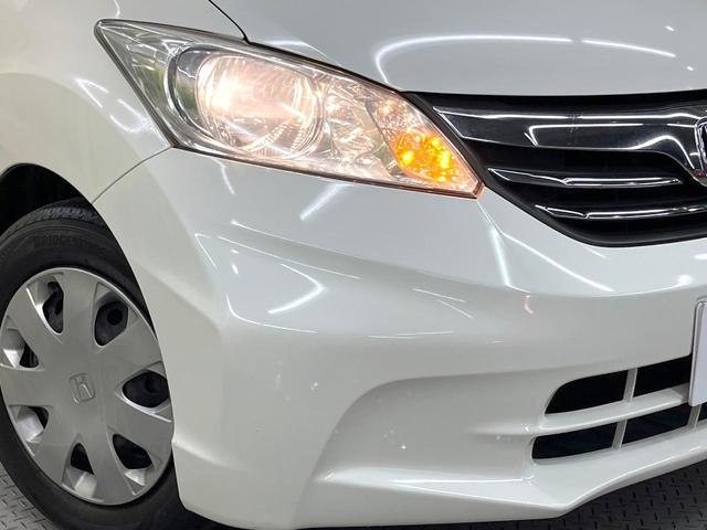 フリード Ｇ　ジャストセレクション　純正ナビ　電動スライドドア　バックカメラ　禁煙車　スマートキー　ＥＴＣ　オートエアコン　ＣＤ　ＤＶＤ再生　地デジ　電動格納ミラー　横滑り防止　プライバシーガラス　パワーウィンドウ　パワーステアリング（13枚目）