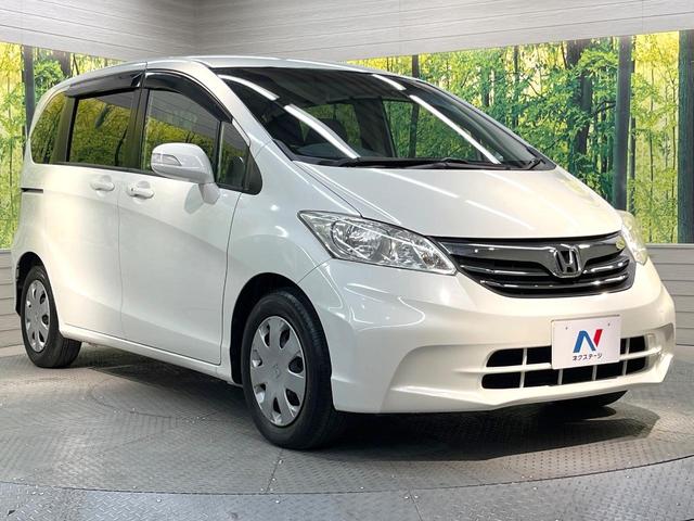 フリード Ｇ　ジャストセレクション　純正ナビ　電動スライドドア　バックカメラ　禁煙車　スマートキー　ＥＴＣ　オートエアコン　ＣＤ　ＤＶＤ再生　地デジ　電動格納ミラー　横滑り防止　プライバシーガラス　パワーウィンドウ　パワーステアリング（17枚目）