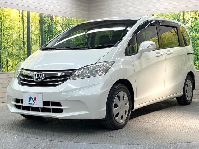 フリード Ｇ　ジャストセレクション　純正ナビ　電動スライドドア　バックカメラ　禁煙車　スマートキー　ＥＴＣ　オートエアコン　ＣＤ　ＤＶＤ再生　地デジ　電動格納ミラー　横滑り防止　プライバシーガラス　パワーウィンドウ　パワーステアリング（25枚目）