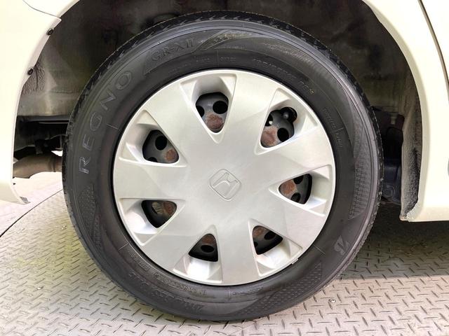 フリード Ｇ　ジャストセレクション　純正ナビ　電動スライドドア　バックカメラ　禁煙車　スマートキー　ＥＴＣ　オートエアコン　ＣＤ　ＤＶＤ再生　地デジ　電動格納ミラー　横滑り防止　プライバシーガラス　パワーウィンドウ　パワーステアリング（29枚目）