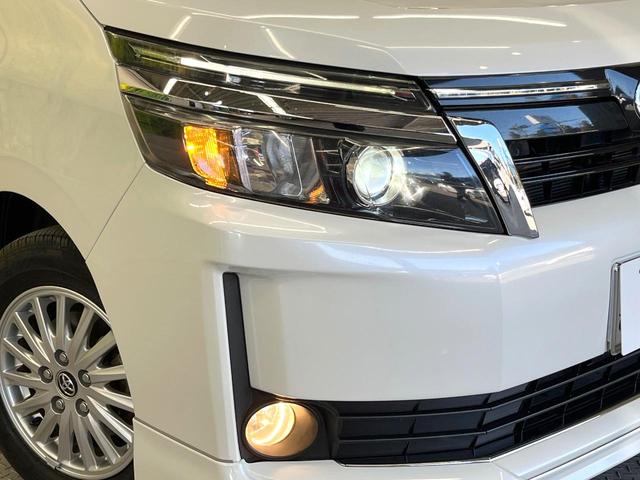 ヴォクシー ハイブリッドＶ　両側電動ドア　純正ナビ　禁煙車　スマートキー　ＬＥＤヘッド　ビルトインＥＴＣ　クルコン　純正１６インチアルミ　　デジタルインナーミラー　オートライト　デュアルエアコン　リアエアコン　Ｂｌｕｅｔｏｏｔｈ（13枚目）