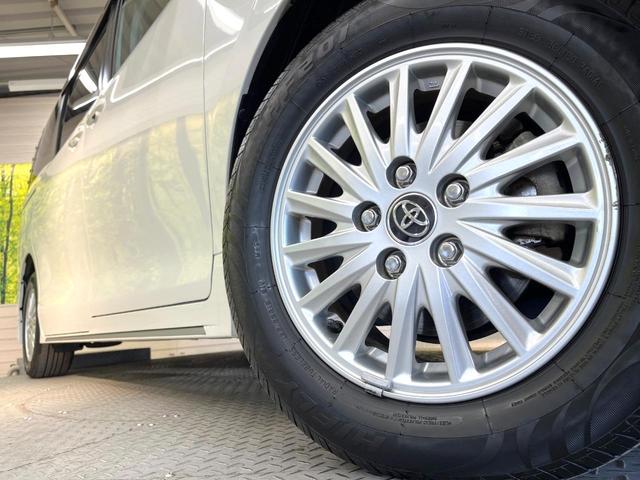 ヴォクシー ハイブリッドＶ　両側電動ドア　純正ナビ　禁煙車　スマートキー　ＬＥＤヘッド　ビルトインＥＴＣ　クルコン　純正１６インチアルミ　　デジタルインナーミラー　オートライト　デュアルエアコン　リアエアコン　Ｂｌｕｅｔｏｏｔｈ（14枚目）