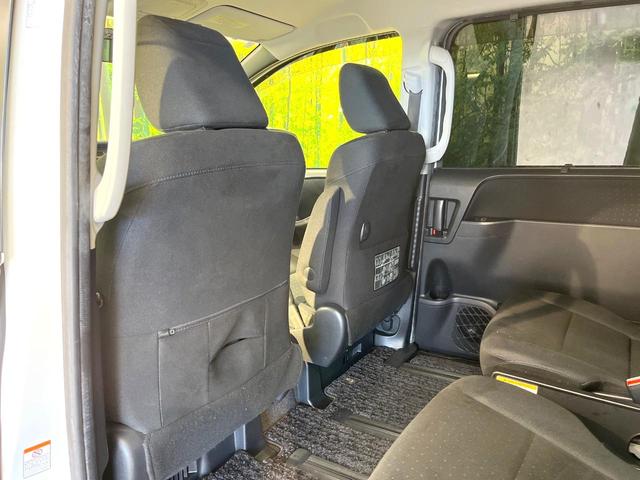 ヴォクシー ハイブリッドＶ　両側電動ドア　純正ナビ　禁煙車　スマートキー　ＬＥＤヘッド　ビルトインＥＴＣ　クルコン　純正１６インチアルミ　　デジタルインナーミラー　オートライト　デュアルエアコン　リアエアコン　Ｂｌｕｅｔｏｏｔｈ（44枚目）