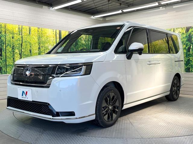 ステップワゴン e:HEVスパーダ 登録済未使用車 純正11.4型ナビ 両側電動ドア バックカメラ 衝突軽減装置 電動リアゲート ハーフレザーシート シートヒーター スマートキー LEDヘッド 純正16インチアルミ オートハイビーム(25枚目)