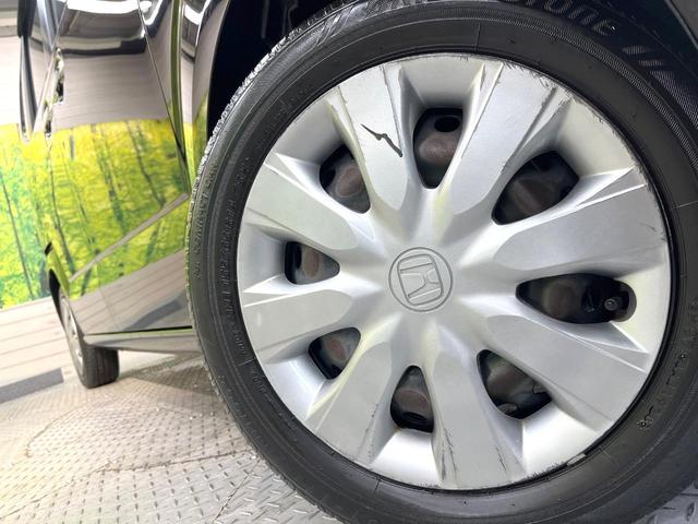 N-BOX G・ターボLパッケージ 電動スライドドア 禁煙車 スマートキー HIDヘッド ETC クルコン オートライト オートエアコン CD アイドリングストップ 電動格納ミラー トラクションコントロール ドアバイザー 衝突安全ボディ(13枚目)