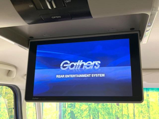 N-BOX G・EXホンダセンシング 純正SDナビ 後席モニター 電動スライドドア バックカメラ 衝突被害軽減システム 禁煙車 スマートキー LEDヘッド ビルトインETC オートハイビーム 車線逸脱警報 オートライト オートエアコン(4枚目)