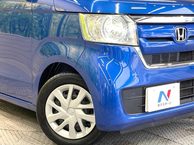 N-BOX G・EXホンダセンシング 純正SDナビ 後席モニター 電動スライドドア バックカメラ 衝突被害軽減システム 禁煙車 スマートキー LEDヘッド ビルトインETC オートハイビーム 車線逸脱警報 オートライト オートエアコン(12枚目)