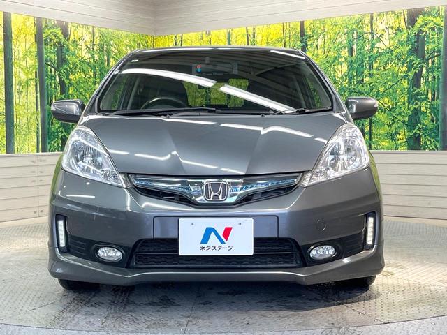 フィットハイブリッド ＲＳ　純正ＳＤナビ　バックカメラ　禁煙車　ドラレコ　スマートキー　ＨＩＤヘッド　ビルトインＥＴＣ　クルコン　純正１６インチアルミ　オートライト　オートエアコン　Ｂｌｕｅｔｏｏｔｈ　ＣＤ　ＤＶＤ再生（14枚目）