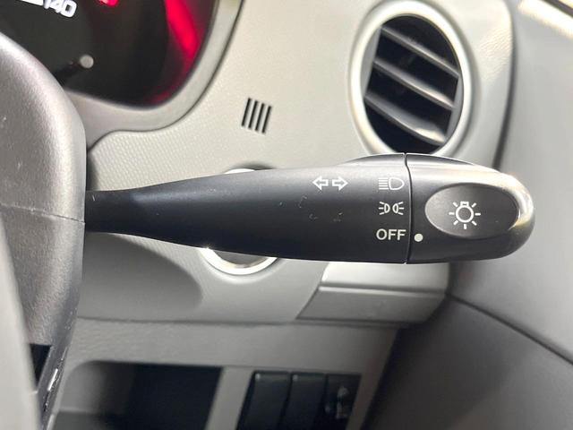 ワゴンＲ ＦＸリミテッド　スマートキー　純正１４インチアルミ　ＣＤオーディオ　電動格納ミラー　ヘッドライトレベライザー（7枚目）