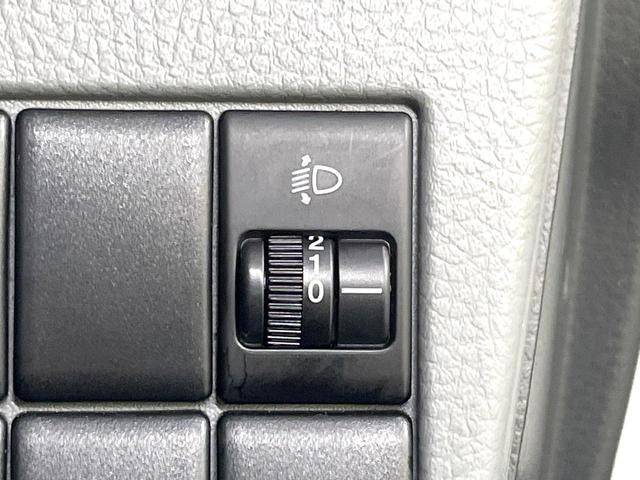 ワゴンＲ ＦＸリミテッド　スマートキー　純正１４インチアルミ　ＣＤオーディオ　電動格納ミラー　ヘッドライトレベライザー（22枚目）