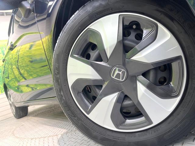フィットハイブリッド L ホンダセンシング 純正SDナビ バックカメラ 衝突被害軽減システム 禁煙車 ハーフレザーシート ドラレコ スマートキー LEDヘッド ビルトインETC 車線逸脱警報 オートライト オートエアコン Bluetooth(12枚目)