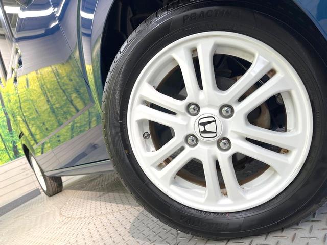 Ｎ－ＢＯＸ ２トーンカラースタイル　Ｇ・Ｌパッケージ　電動スライドドア　ＳＤナビ　禁煙車　スマートキー　純正１４インチアルミ　オートエアコン　Ｂｌｕｅｔｏｏｔｈ　ＣＤ　ＤＶＤ再生　フルセグ（12枚目）