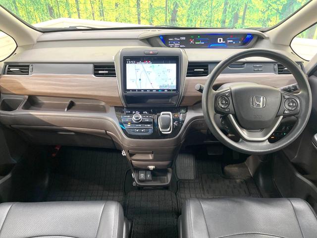 フリードハイブリッド ハイブリッド・Ｇホンダセンシング　純正９型ＳＤナビ　バックカメラ　両側電動ドア　衝突被害軽減システム　禁煙車　スマートキー　ＬＥＤヘッド　ビルトインＥＴＣ　車線逸脱警報　オートライト　オートエアコン　Ｂｌｕｅｔｏｏｔｈ（2枚目）