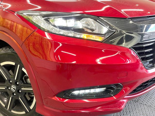 ヴェゼル ハイブリッドZ・ホンダセンシング 純正8型SDナビ バックカメラ 衝突被害軽減システム 禁煙車 スマートキー LEDヘッド ビルトインETC 16インチアルミ 車線逸脱警報 オートライト デュアルエアコン Bluetooth CD(12枚目)