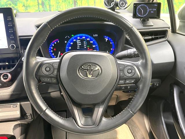 カローラツーリング ハイブリッド　ダブルバイビー　モデリスタエアロ　９型ディスプレイオーディオ　バックカメラ　１００Ｖ電源　衝突被害軽減システム　レーダークルーズ　禁煙車　ハーフレザーシート　スマートキー　ＬＥＤヘッド　ＥＴＣ２．０（11枚目）