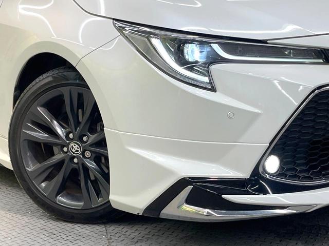 カローラツーリング ハイブリッド　ダブルバイビー　モデリスタエアロ　９型ディスプレイオーディオ　バックカメラ　１００Ｖ電源　衝突被害軽減システム　レーダークルーズ　禁煙車　ハーフレザーシート　スマートキー　ＬＥＤヘッド　ＥＴＣ２．０（12枚目）