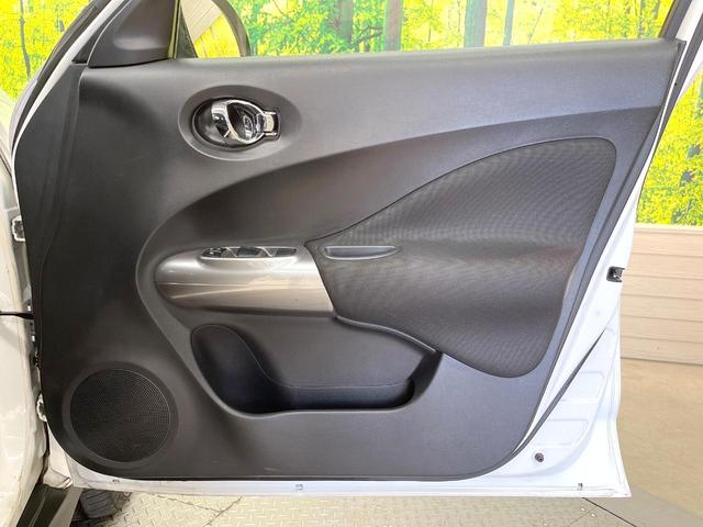 ジューク 15RX タイプV 純正SDナビ バックカメラ 禁煙車 スマートキー オートライト オートエアコン CD フルセグ 電動格納ミラー 衝突安全ボディ 横滑り防止 盗難防止システム(48枚目)
