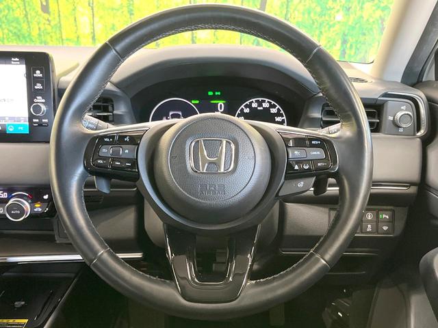 ヴェゼル ｅ：ＨＥＶ　Ｚ　バックカメラ　衝突被害軽減システム　禁煙車　電動リアゲート　ハーフレザーシート　コーナーセンサー　スマートキー　ＬＥＤヘッド　ＥＴＣ２．０　純正１８インチアルミ　オートハイビーム　車線逸脱警報（11枚目）