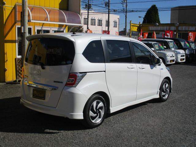 フリードハイブリッド ジャストセレクション　純正ＳＤナビ　バックカメラ　ＥＴＣ　フルセグ　両側自動スライド　オートクルーズ　フリップダウンモニター（2枚目）