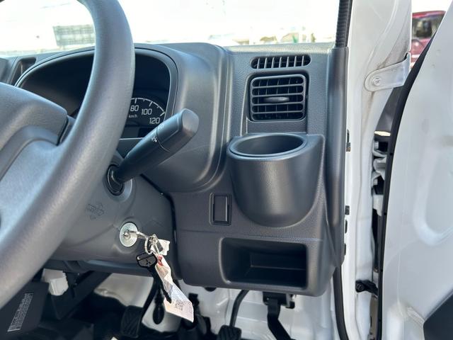 ミニキャブトラック Ｍ　軽トラック　ＭＴ　オートライト　ＥＳＣ　エアコン　運転席エアバッグ　助手席エアバッグ　記録簿（22枚目）