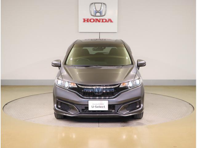 フィットハイブリッド Ｆ　地デジＴＶ　ナビＴＶ　リアカメラ　横滑り防止装置　フルオートエアコン　イモビライザー　ドライブレコーダー　キーフリーシステム　全席パワーウインドウ　パワーステアリング　アクティブクルーズ　ＡＢＳ（2枚目）