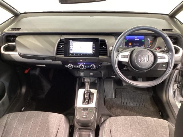 フィット ｅ：ＨＥＶホーム　フルセグ地デジＴＶ　助手席エアバック　衝突軽減ブレ－キ　前後障害物センサー　アクティブクルーズコントロール　ＤＶＤ再生可　Ｂモニター　ＥＴＣ付　ＬＥＤヘッドランプ　イモビライザー（14枚目）