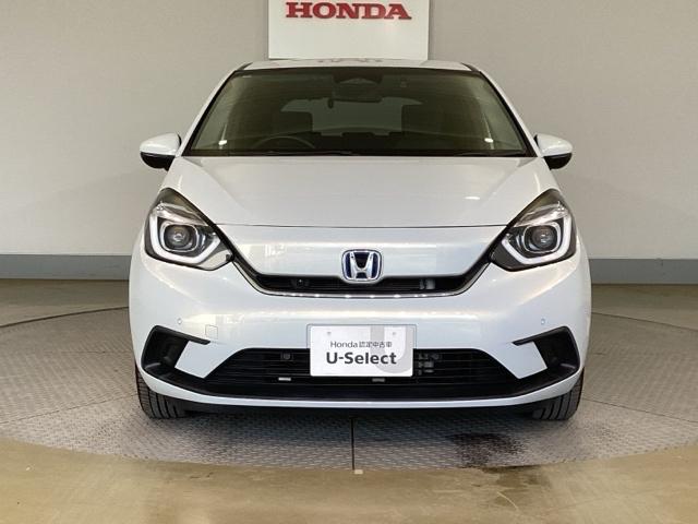 フィット ｅ：ＨＥＶホーム　助手席エアバック　衝突軽減ブレ－キ　前後障害物センサー　アクティブクルーズコントロール　Ｂモニター　ＥＴＣ付　ＵＳＢ　ＬＥＤヘッドランプ　イモビライザー　スマートキー　Ｄレコ　ＶＳＡ（2枚目）