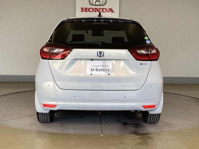 フィット ｅ：ＨＥＶホーム　助手席エアバック　衝突軽減ブレ－キ　前後障害物センサー　アクティブクルーズコントロール　Ｂモニター　ＥＴＣ付　ＵＳＢ　ＬＥＤヘッドランプ　イモビライザー　スマートキー　Ｄレコ　ＶＳＡ（6枚目）